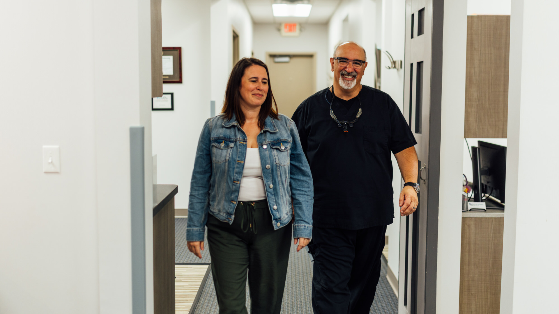 Dr. David Tartaglia and his patient walking together at Generations Dental in Poplar Grove, IL